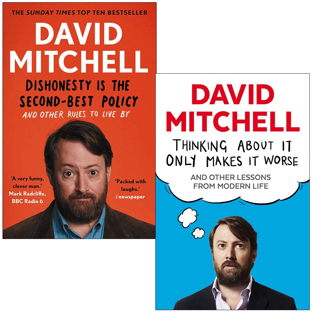 David Mitchell Collection set of 2 paperback non-fiction books by David Mitchell and others on a wooden surface.