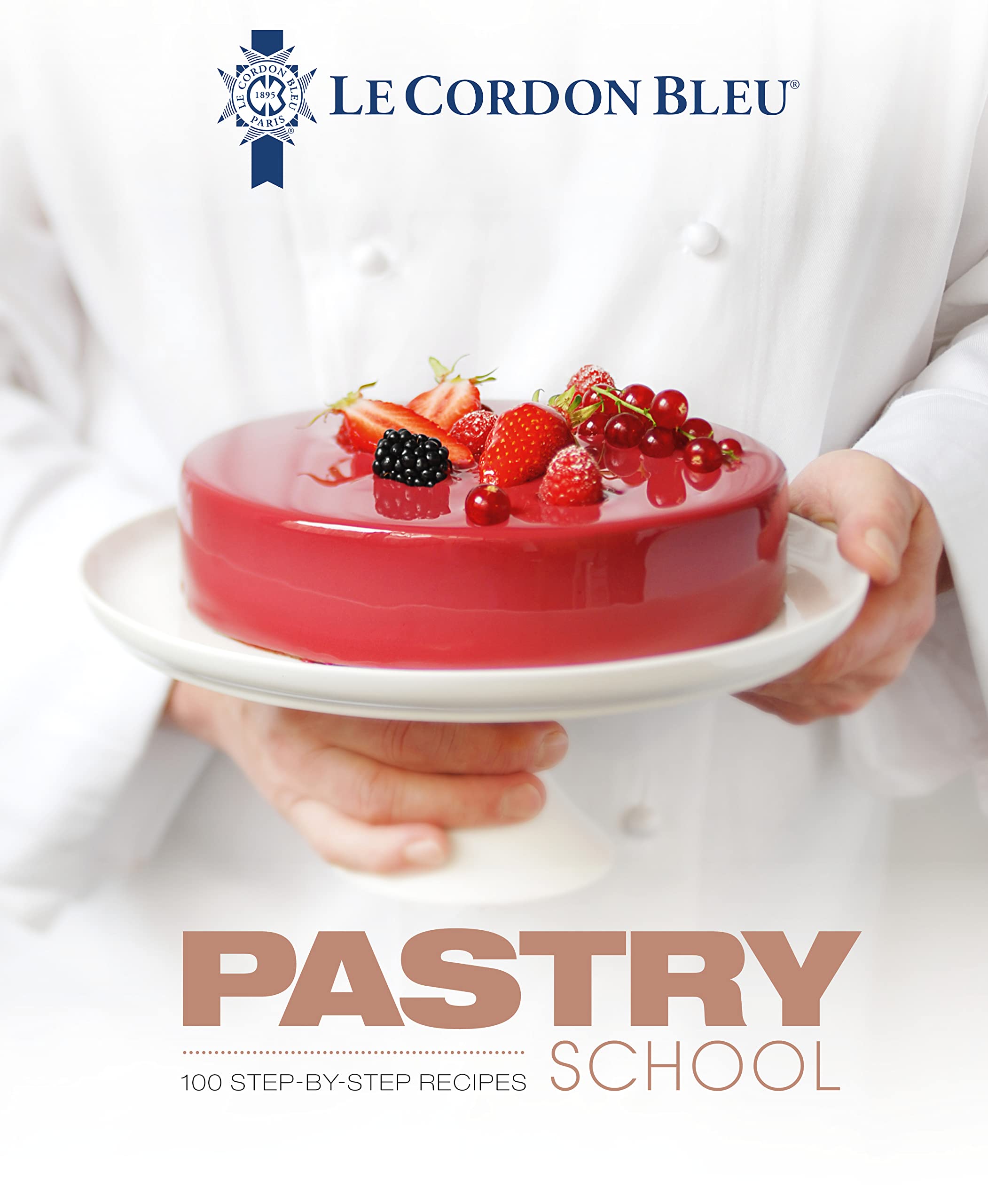 Le Cordon Bleu Pastry School hardback book cover with elegant pastry designs and classic baking tools.