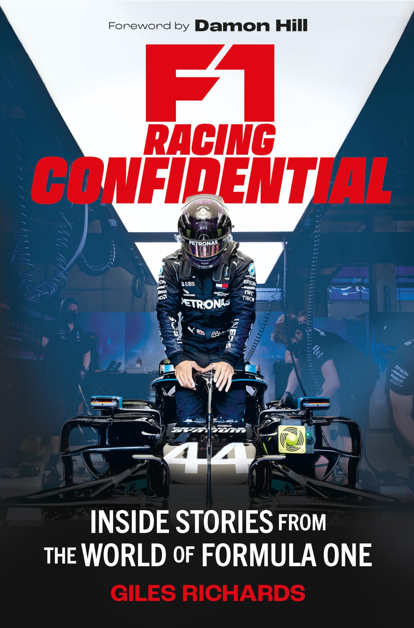 Hardback book "F1 Racing Confidential" by Giles Richards featuring a dynamic Formula 1 racing cover design.