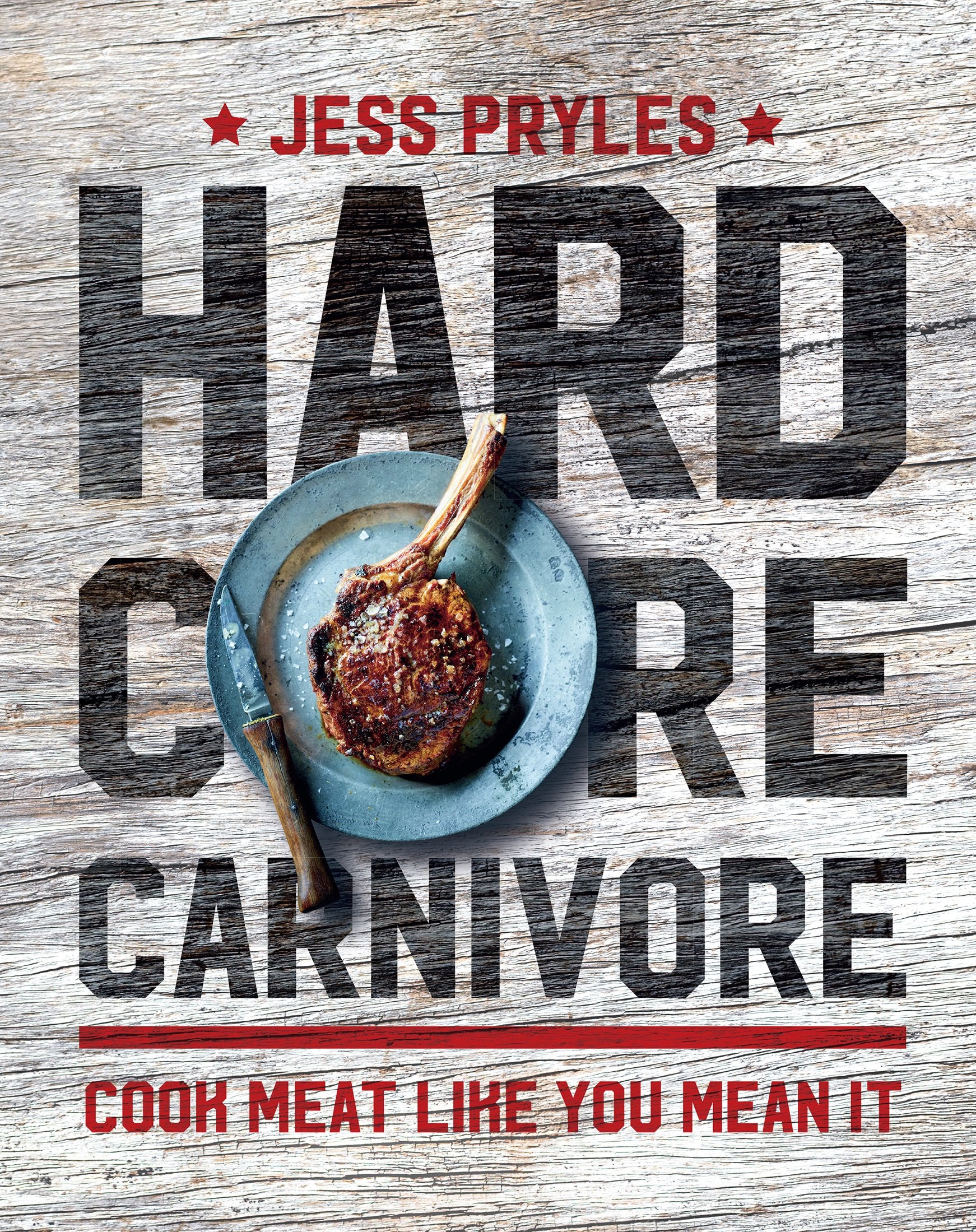 Hardcore Carnivore cookbook by Jess Pryles, showcasing vibrant meat dishes on a wooden table with grilling tools.