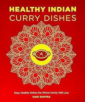 Rooza Collection by Nadiya Hussain, two paperback non-fiction books stacked on a wooden surface.