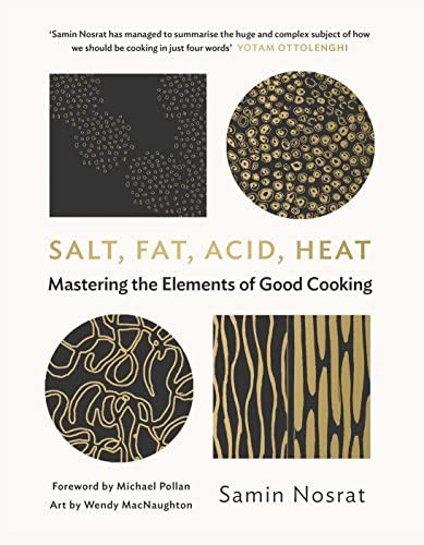 Hardback copy of "Salt, Fat, Acid, Heat" by Samin Nosrat, showcasing the book cover with title and author.