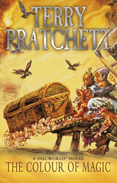 Ten paperback books from the Discworld series by Terry Pratchett, featuring colorful covers and distinct titles.
