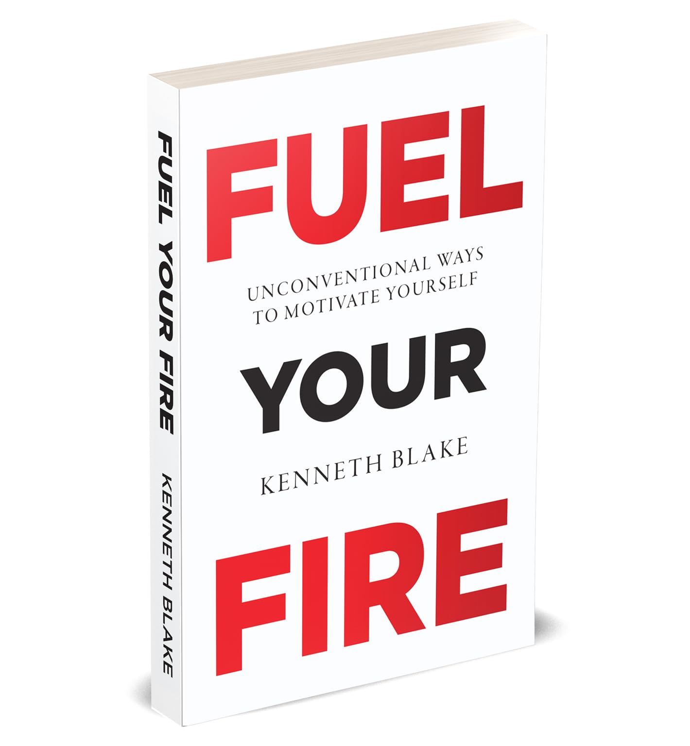 Fuel Your Fire by Kenneth Blake, a paperback non-fiction book, displayed on a wooden surface with a blurred background.