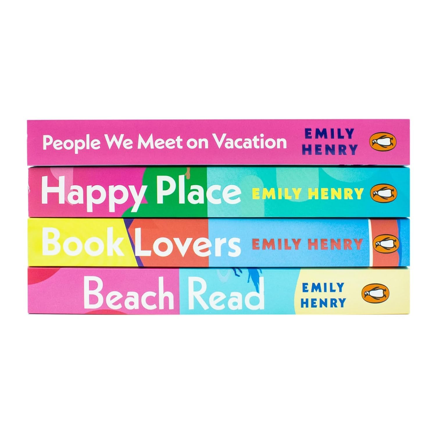 Four paperback fiction books by Emily Henry in a collection set, featuring colorful covers and stacked on a surface.