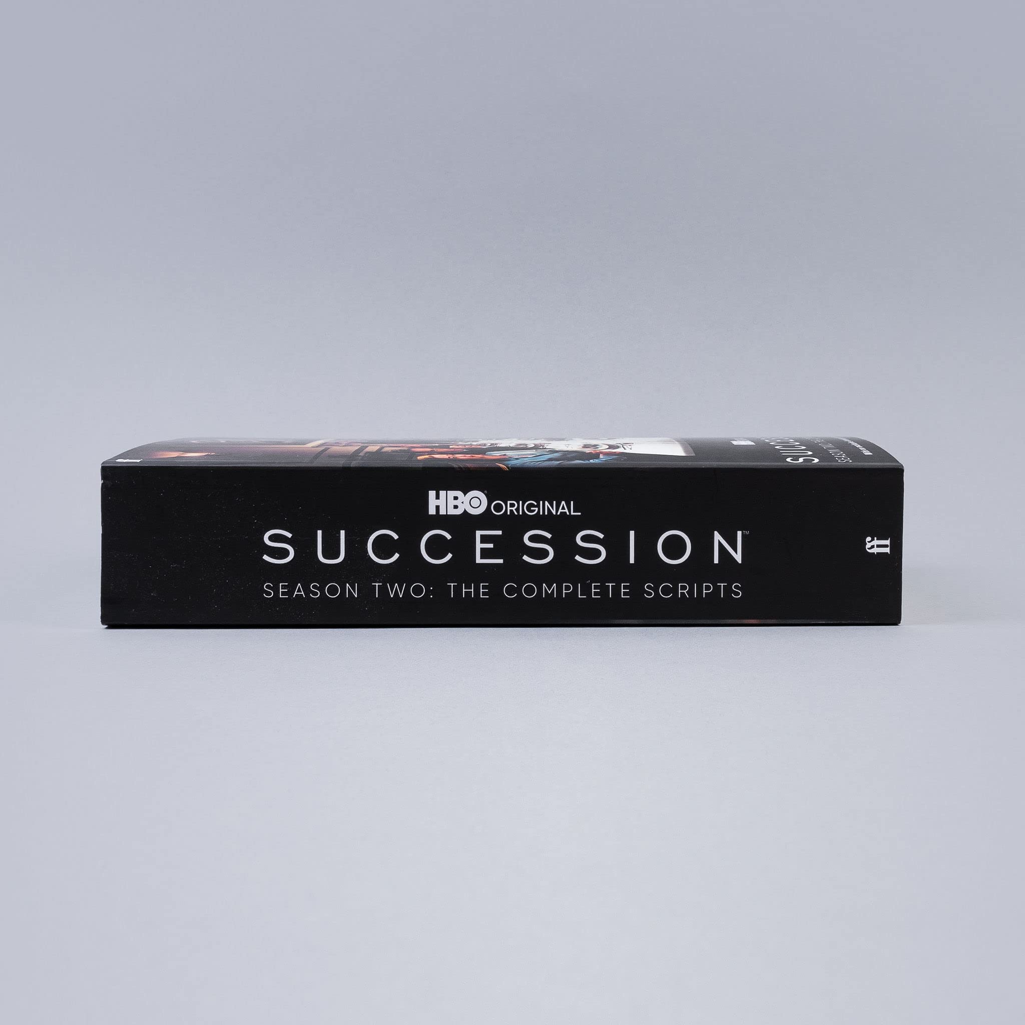 Complete scripts of Succession Season Two in paperback by Jesse Armstrong, showcasing the book cover and spine details.