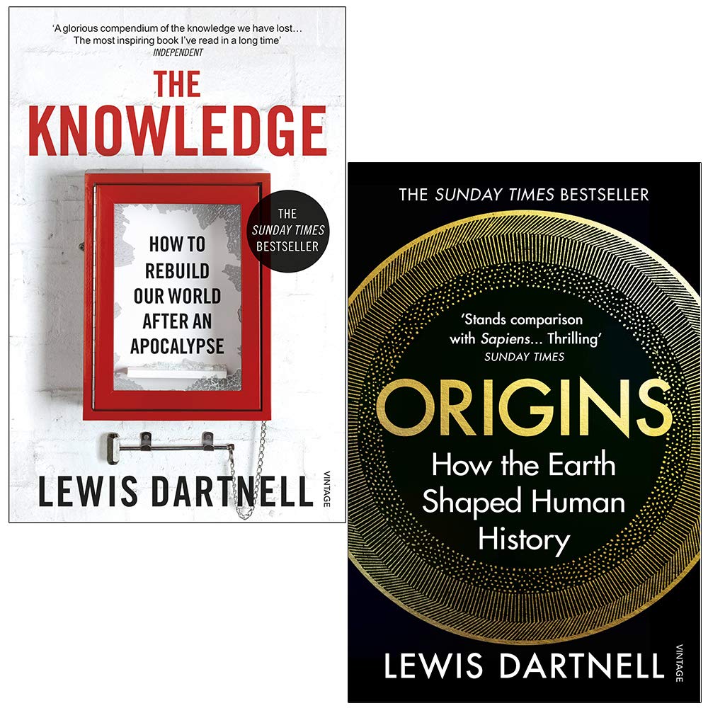 Lewis Dartnell vintage paperback book collection set featuring two non-fiction titles on a wooden table.