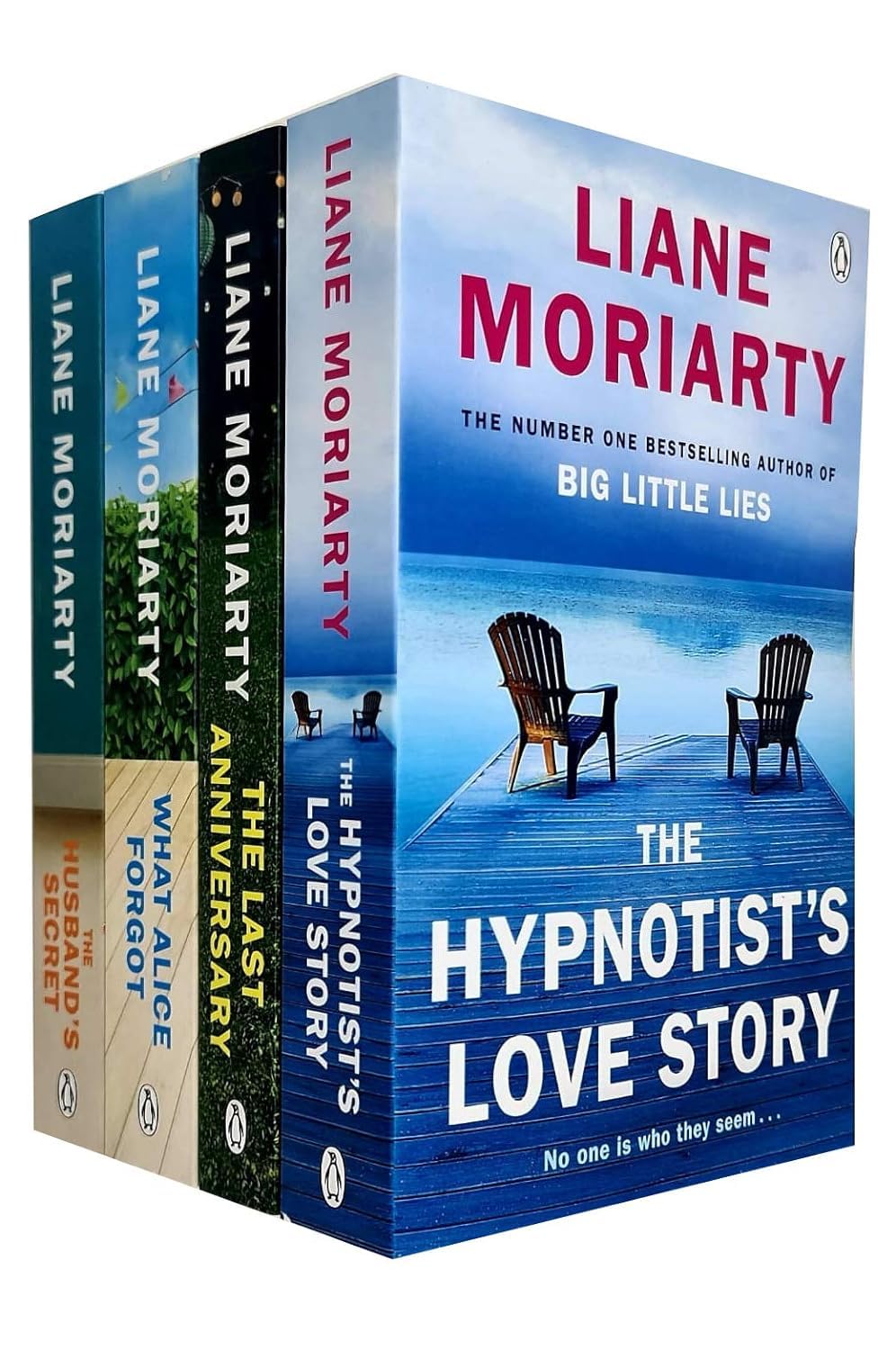 Four paperback books by Liane Moriarty, including titles from the Fiction collection, arranged in a set.