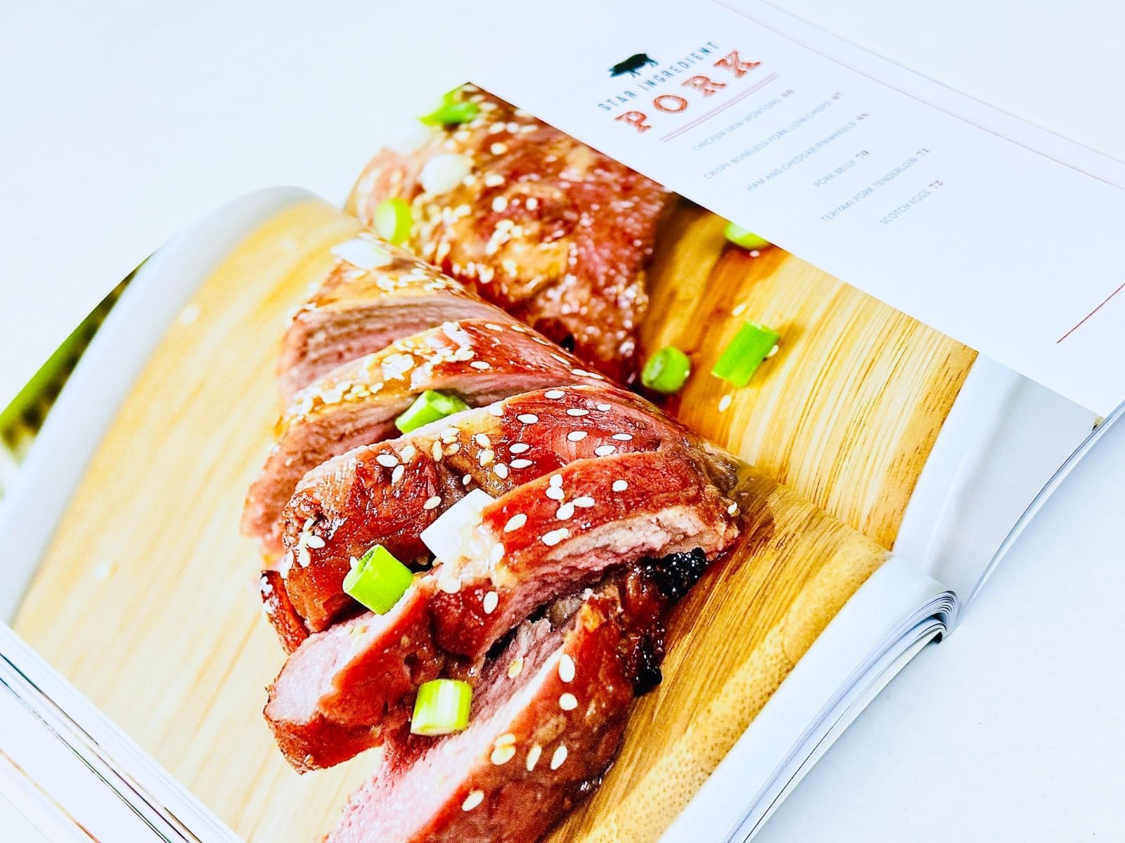 Quick and Easy Air Fryer Cookbook by MSN Carolina Cartier, featuring a colorful cover and easy-to-read recipe layout.