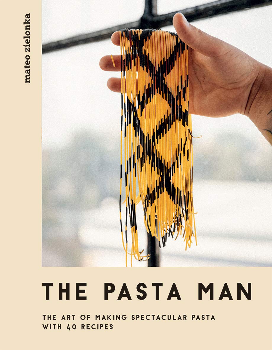 Hardback book cover of "The Pasta Man: Art of Spectacular Pasta" by Mateo Zielonka, featuring vibrant pasta imagery.