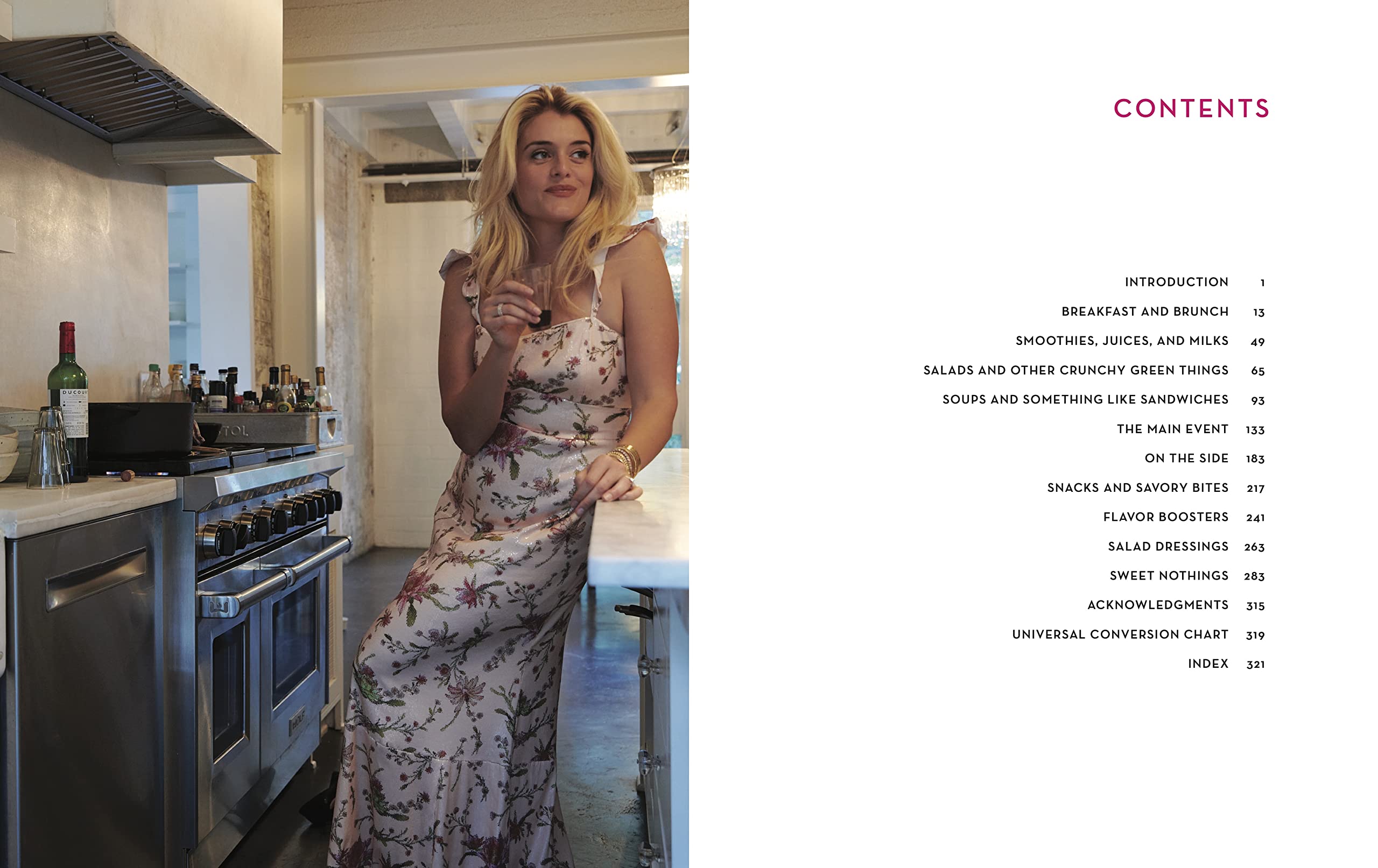 Hardback copy of "Eat Your Heart Out" by Daphne Oz, featuring a colorful cookbook cover with food imagery.