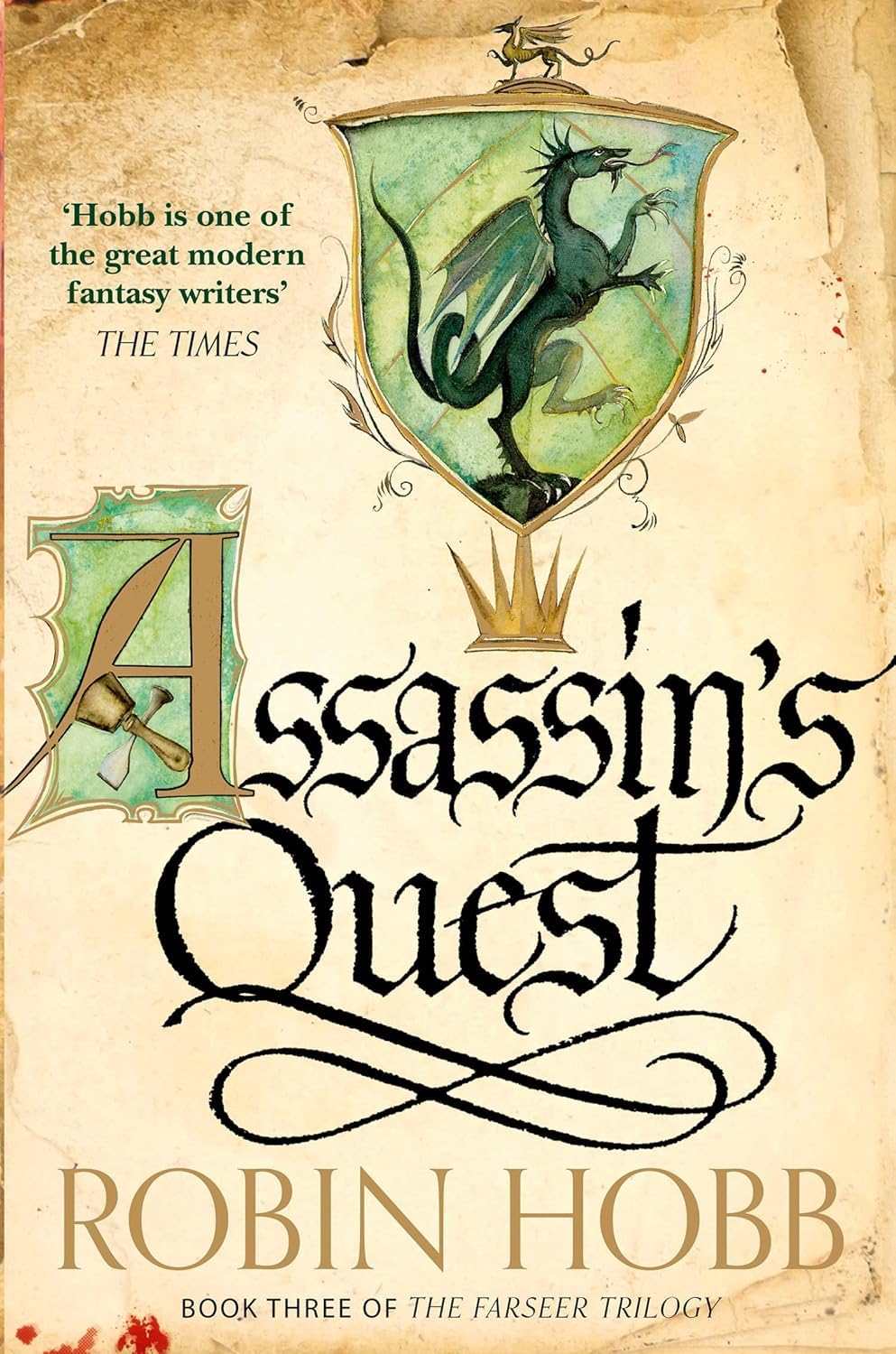 Three paperback books from Robin Hobb's Farseer Trilogy collection, published by Harper Voyager, featuring fantasy fiction covers.