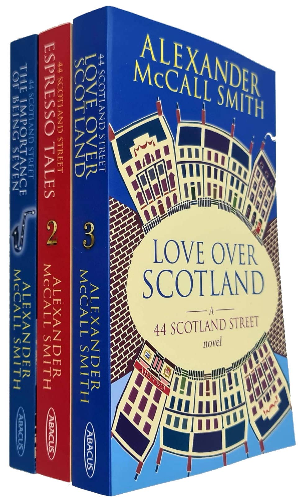 44 Scotland Street series by Alexander McCall Smith, three paperback books stacked on a table.