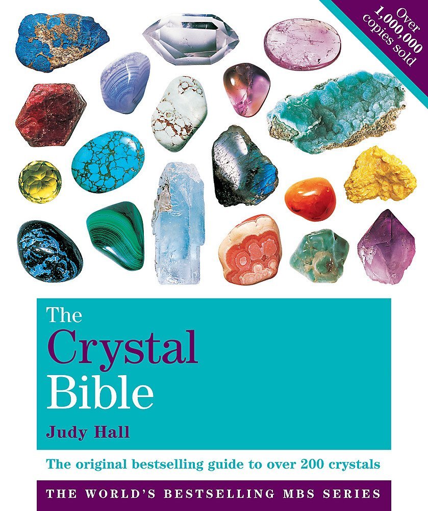Three paperback books from "The Crystal Bible" collection by Judy Hall displayed together on a white background.