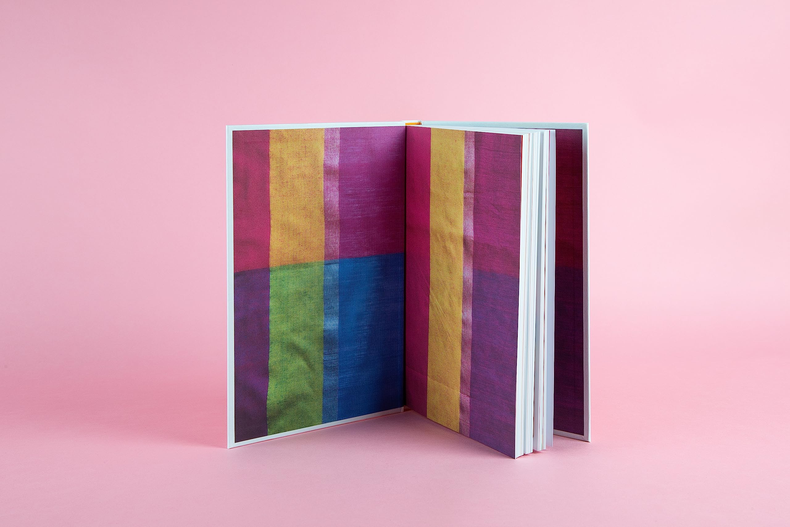 Hardback book "India Express" by Rukmini Iyer with colorful cover featuring Indian cuisine and vibrant imagery.