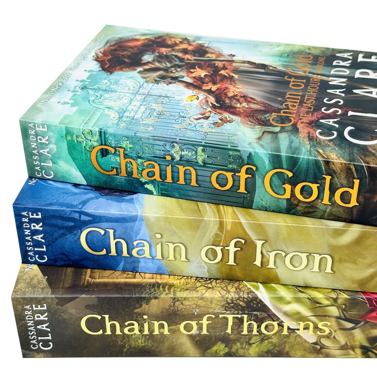 Set of three paperback fantasy books from Cassandra Clare's Last Hours collection, featuring vibrant covers and detailed artwork.