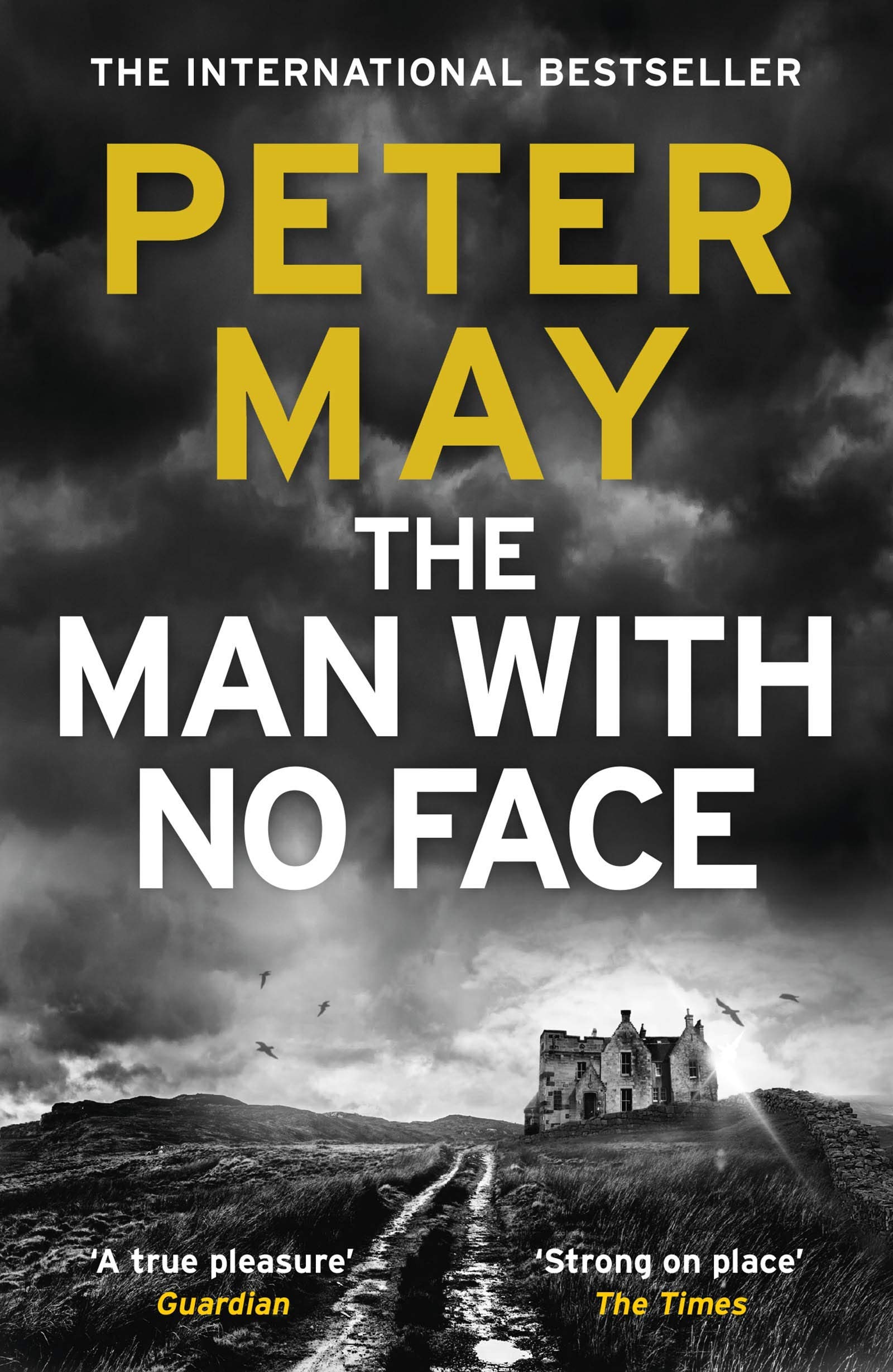 Peter May Collection set featuring three paperback fiction books by Peter May displayed together on a wooden surface.