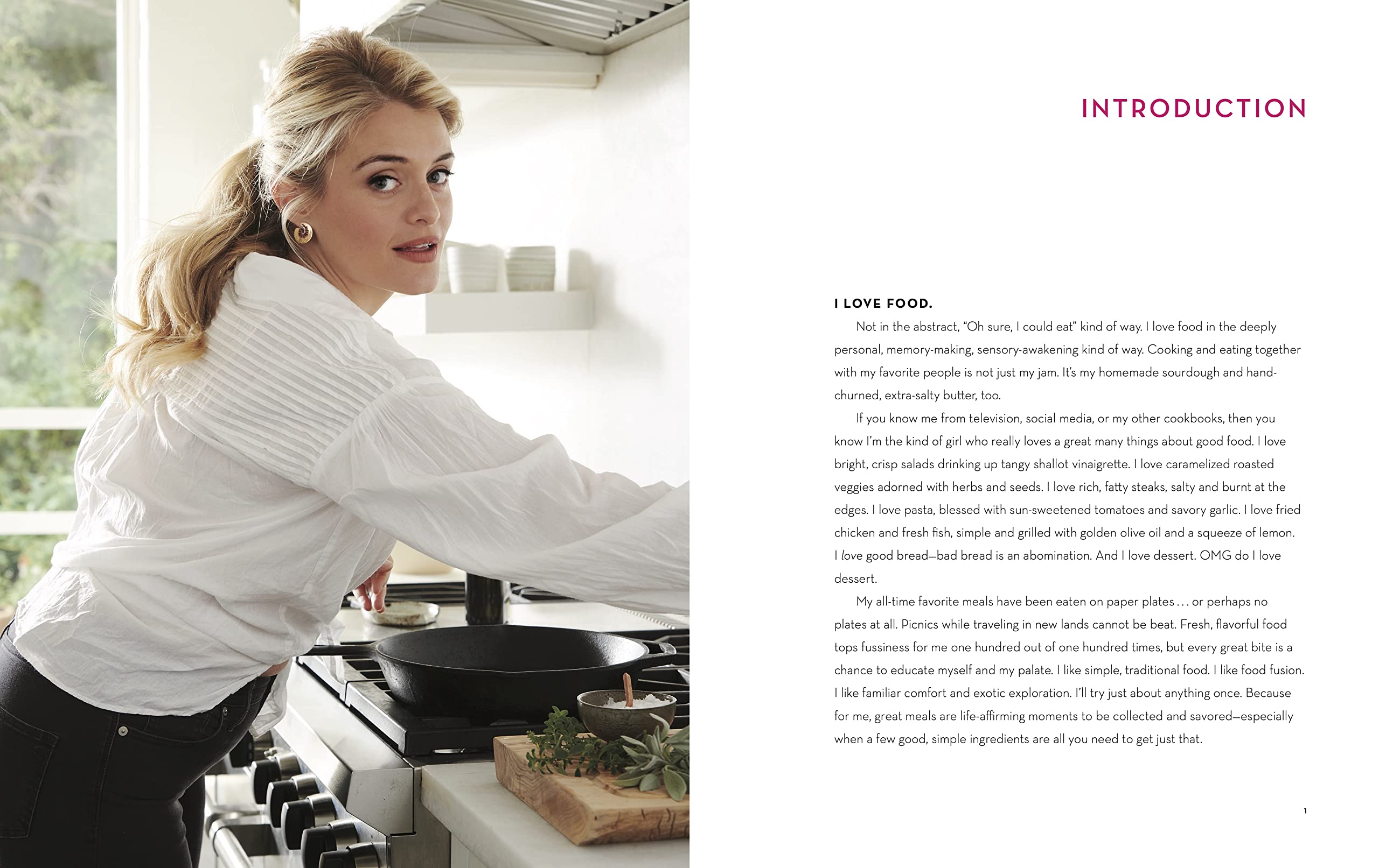 Hardback copy of "Eat Your Heart Out" by Daphne Oz, featuring a colorful, appetizing food image on the cover.