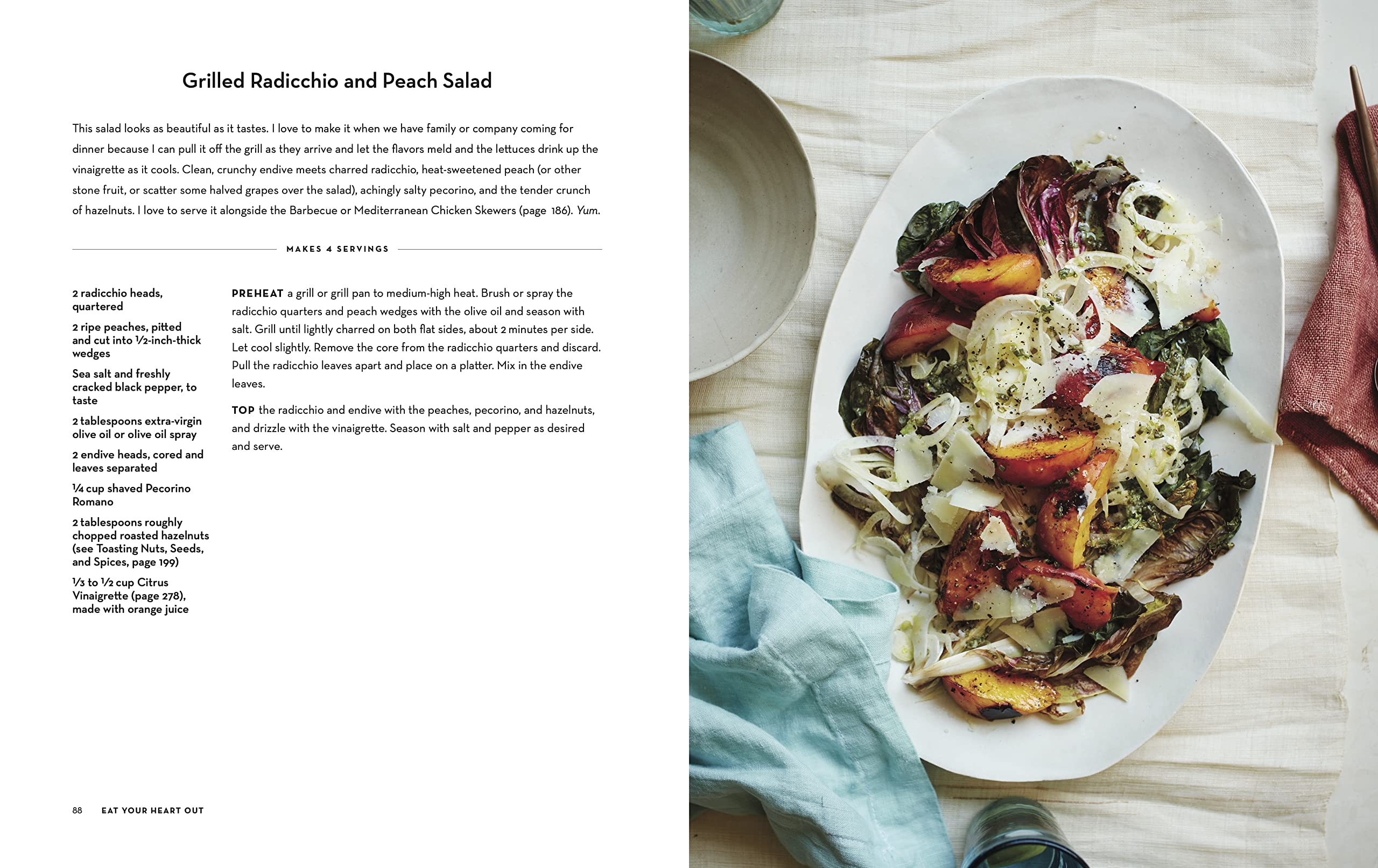 Hardback copy of "Eat Your Heart Out" by Daphne Oz, featuring a colorful cookbook cover with appetizing food imagery.