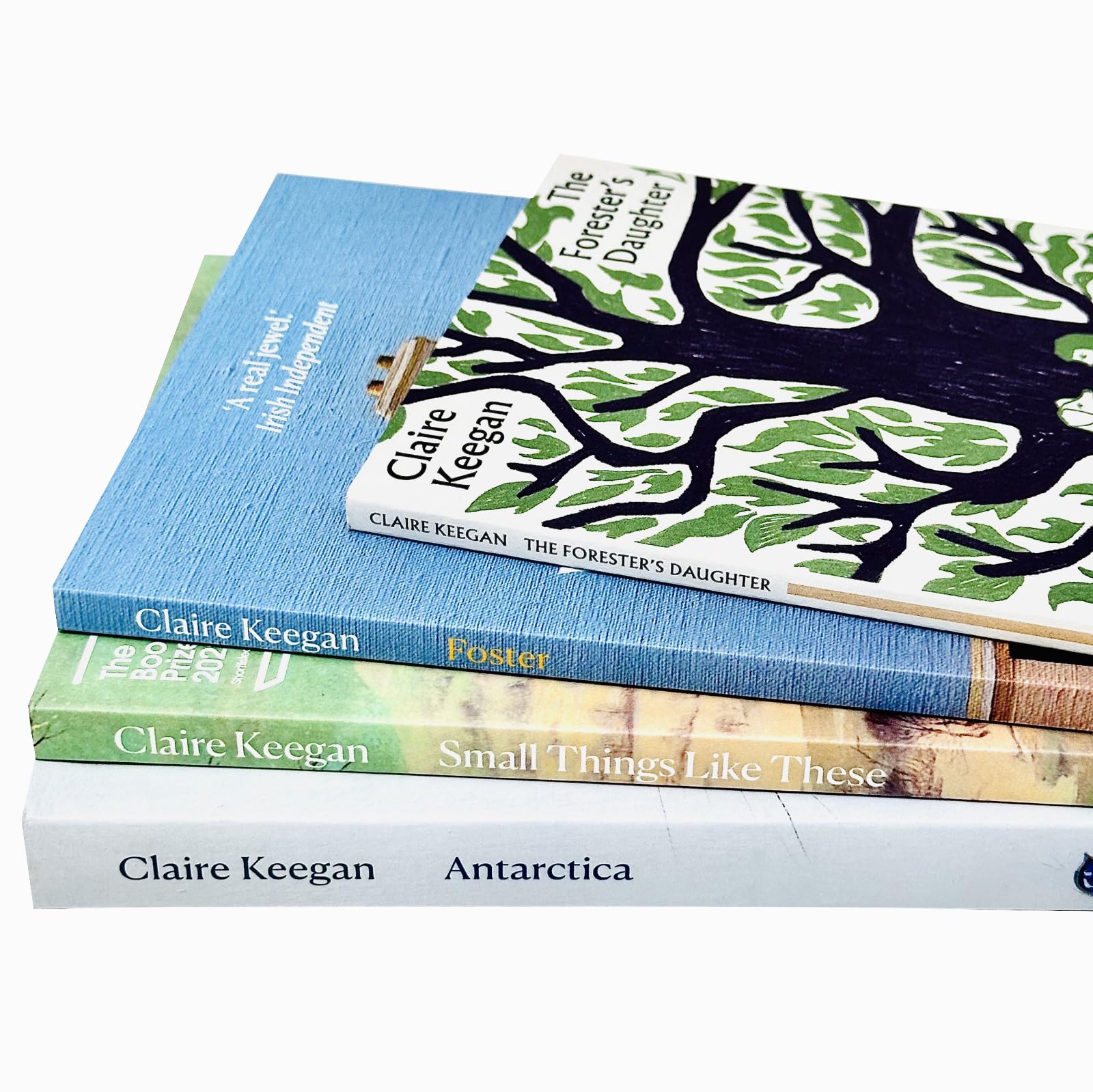 Four paperback books from the Claire Keegan collection, showcasing fiction titles by Faber & Faber Ltd, with cover art visible.