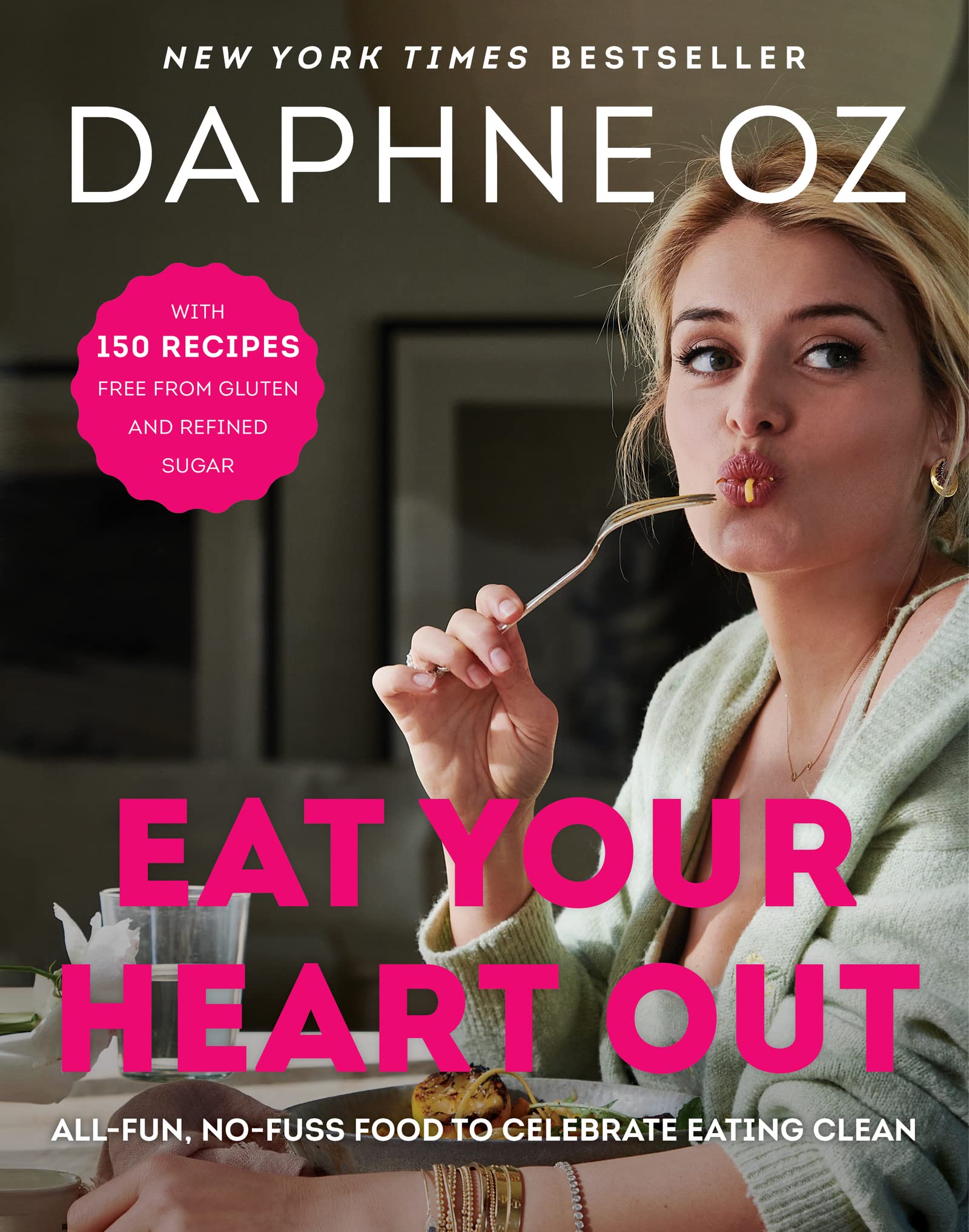 Hardback edition of "Eat Your Heart Out" by Daphne Oz, featuring colorful cookbook cover with food imagery.