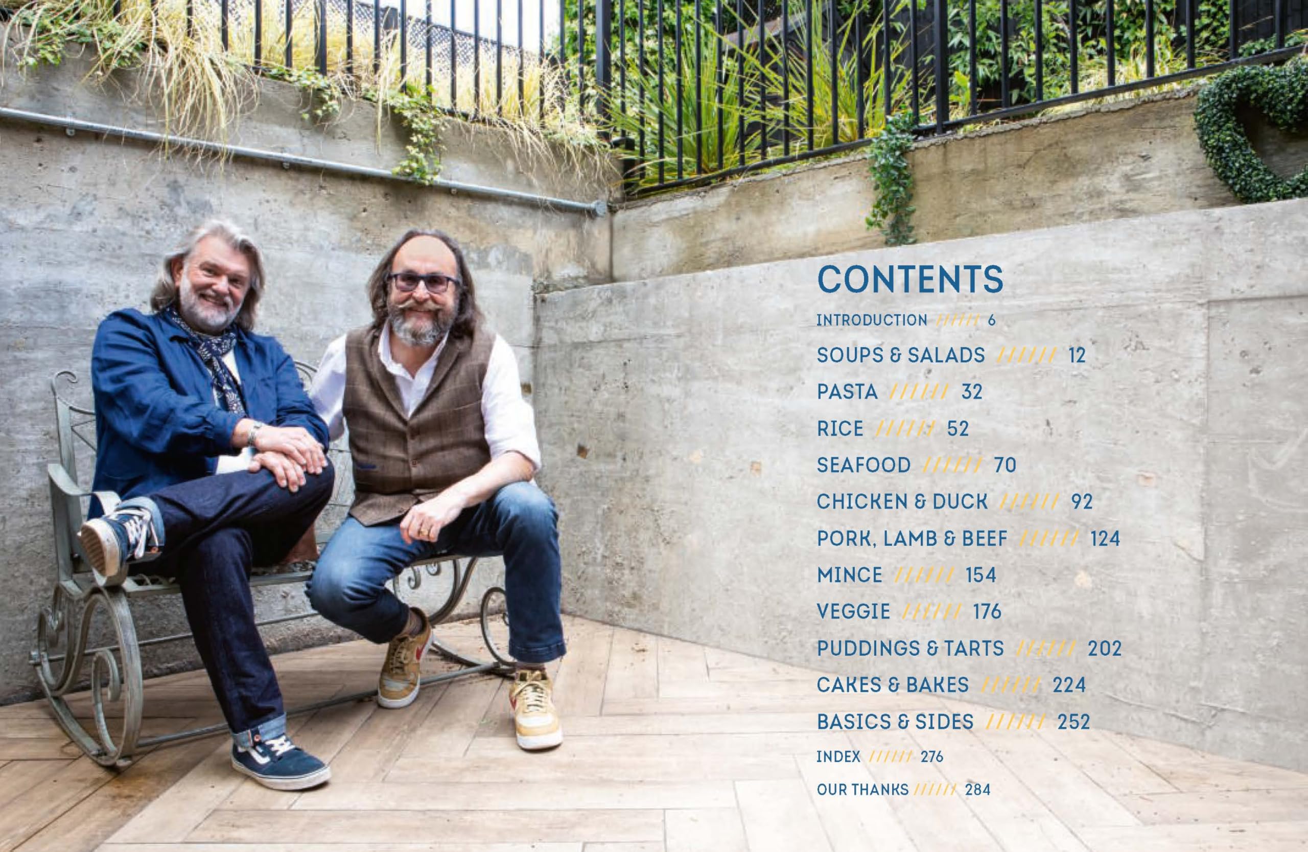 Hardback copy of Hairy Bikers' Everyday Winners cookbook by Hairy Bikers featuring vibrant food photography on the cover.