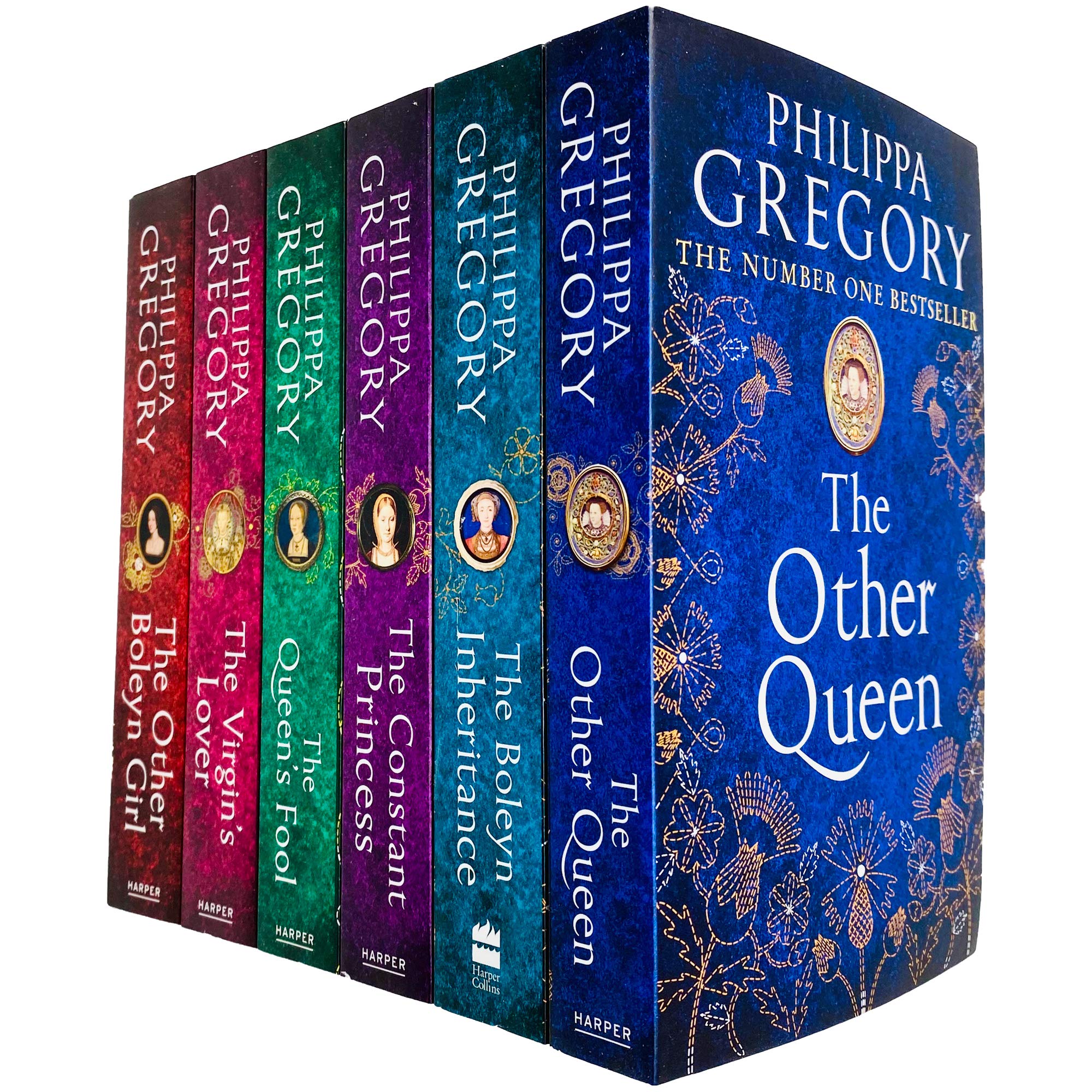 Tudor Court Series by Philippa Gregory, six paperback fiction books displayed together on a wooden surface.
