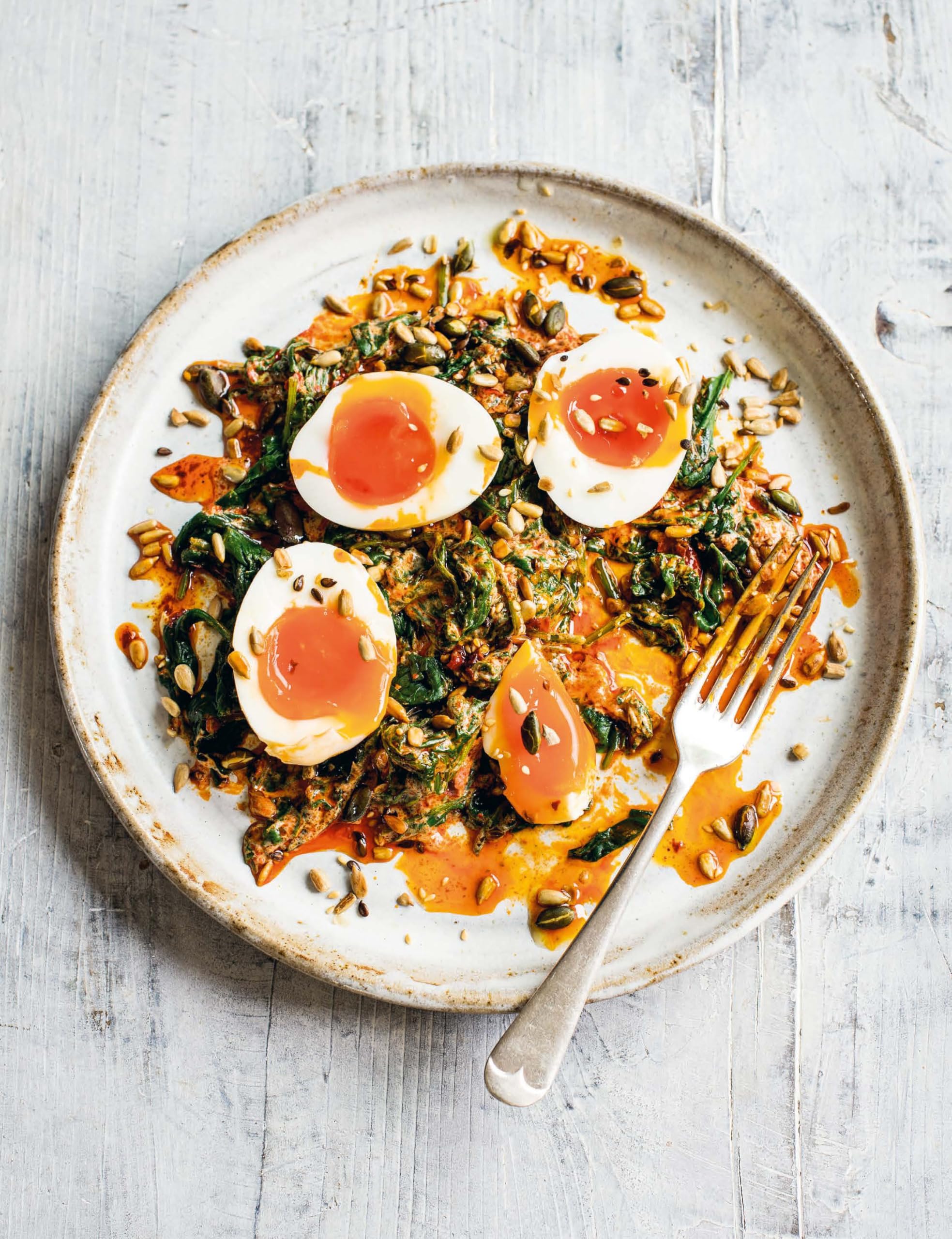 The Fast 800 Keto Recipe Book by Clare Bailey, showing a paperback cover with vibrant images and bold title.