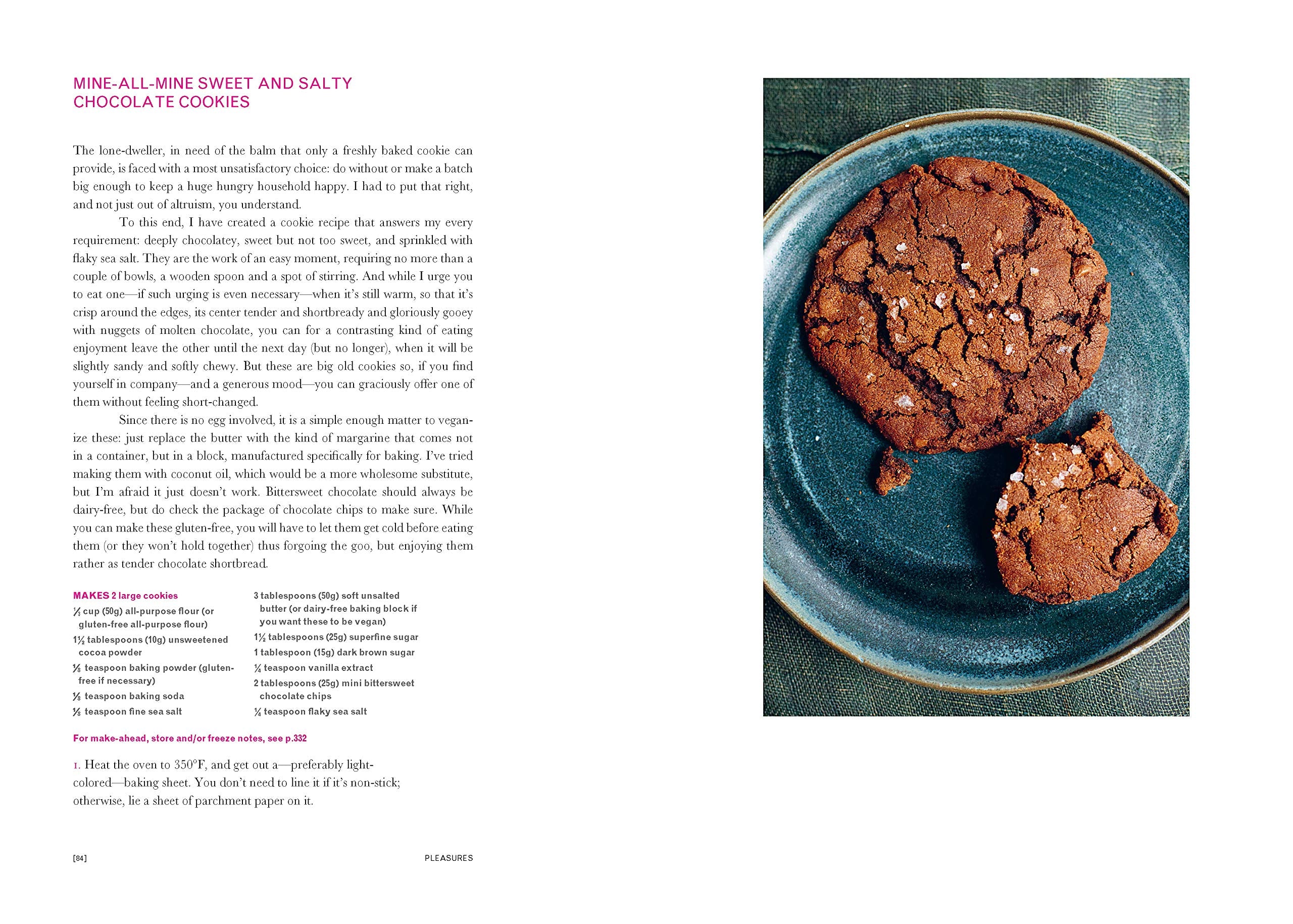 Hardback copy of "Cook, Eat, Repeat" by Nigella Lawson featuring ingredients, recipes, and stories on the cover.