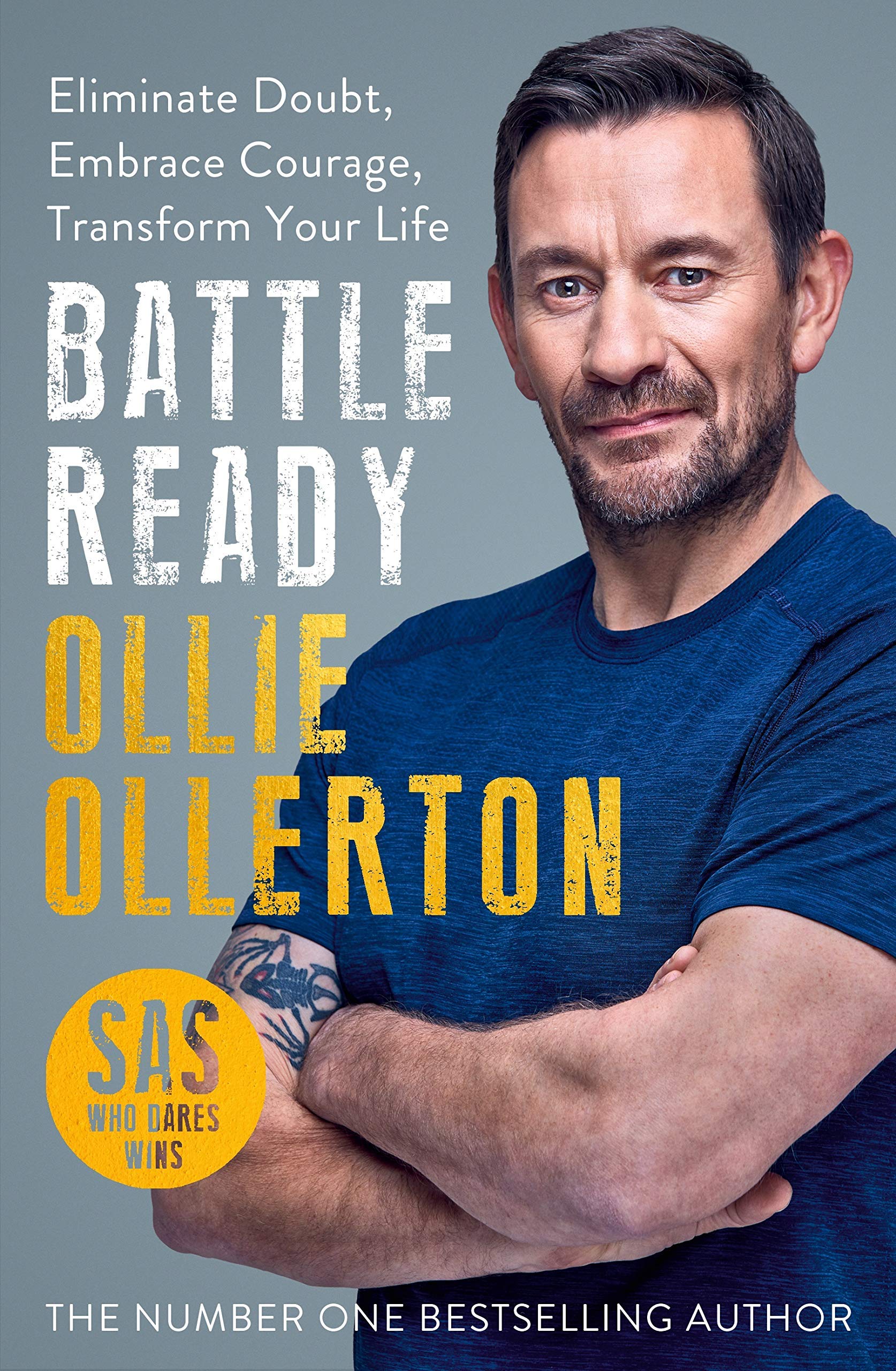 Two paperback books from the Battle Ready collection by Ollie Ollerton and Anthony Middleton on a wooden surface.