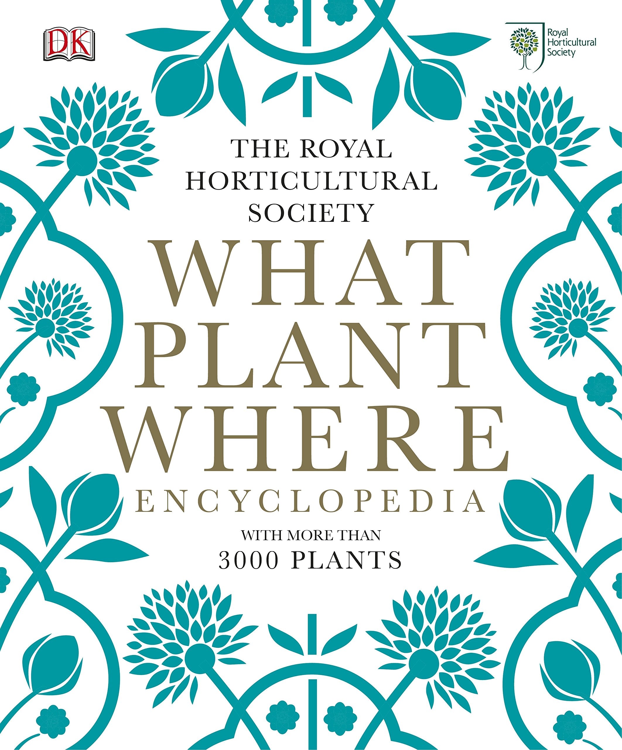 RHS What Plant Where Encyclopedia hardback book by Royal Horticultural Society on a wooden table with plants in the background.