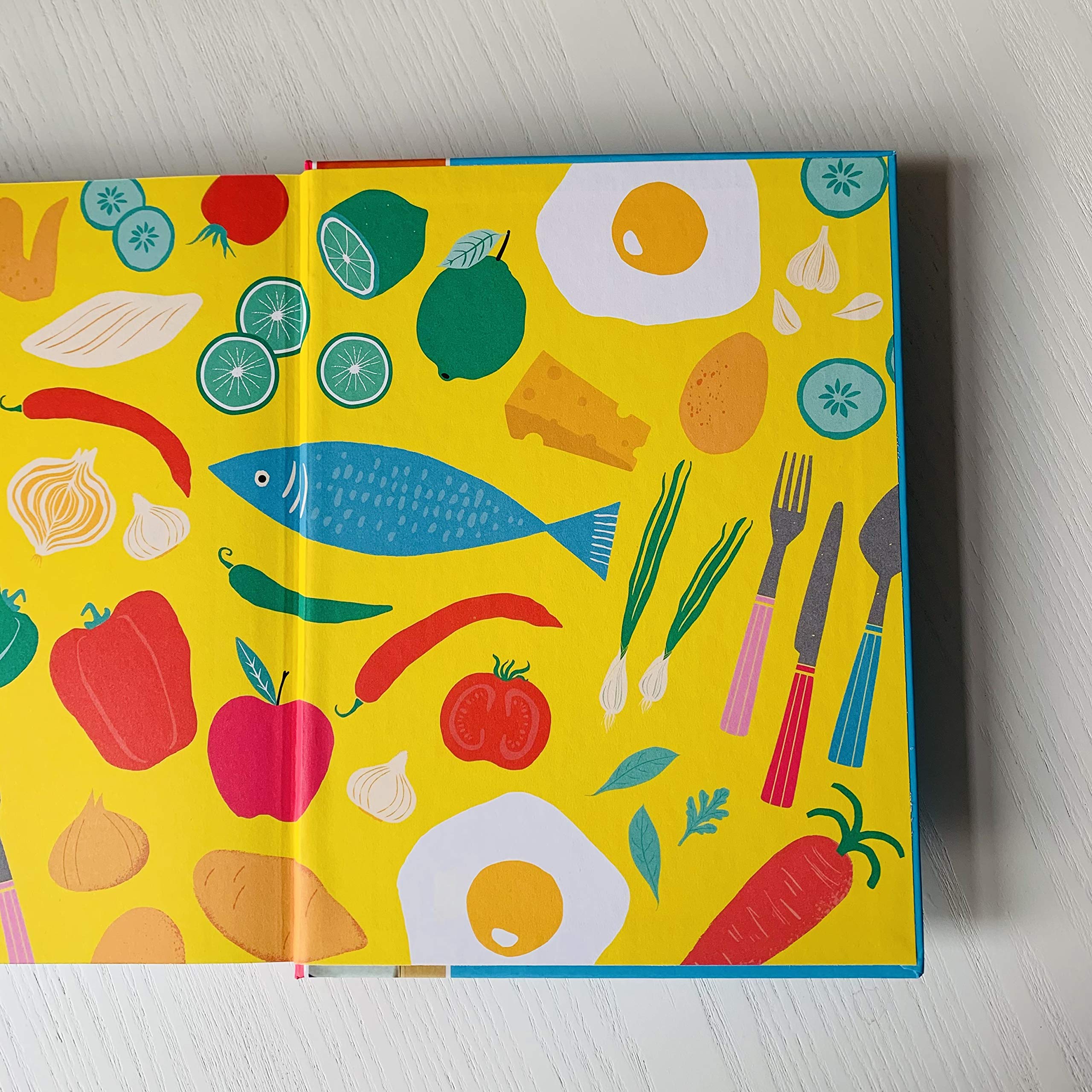 Hardback book "Pinch of Nom Quick and Easy" by Kay Featherstone, showcasing the cover design and title prominently.