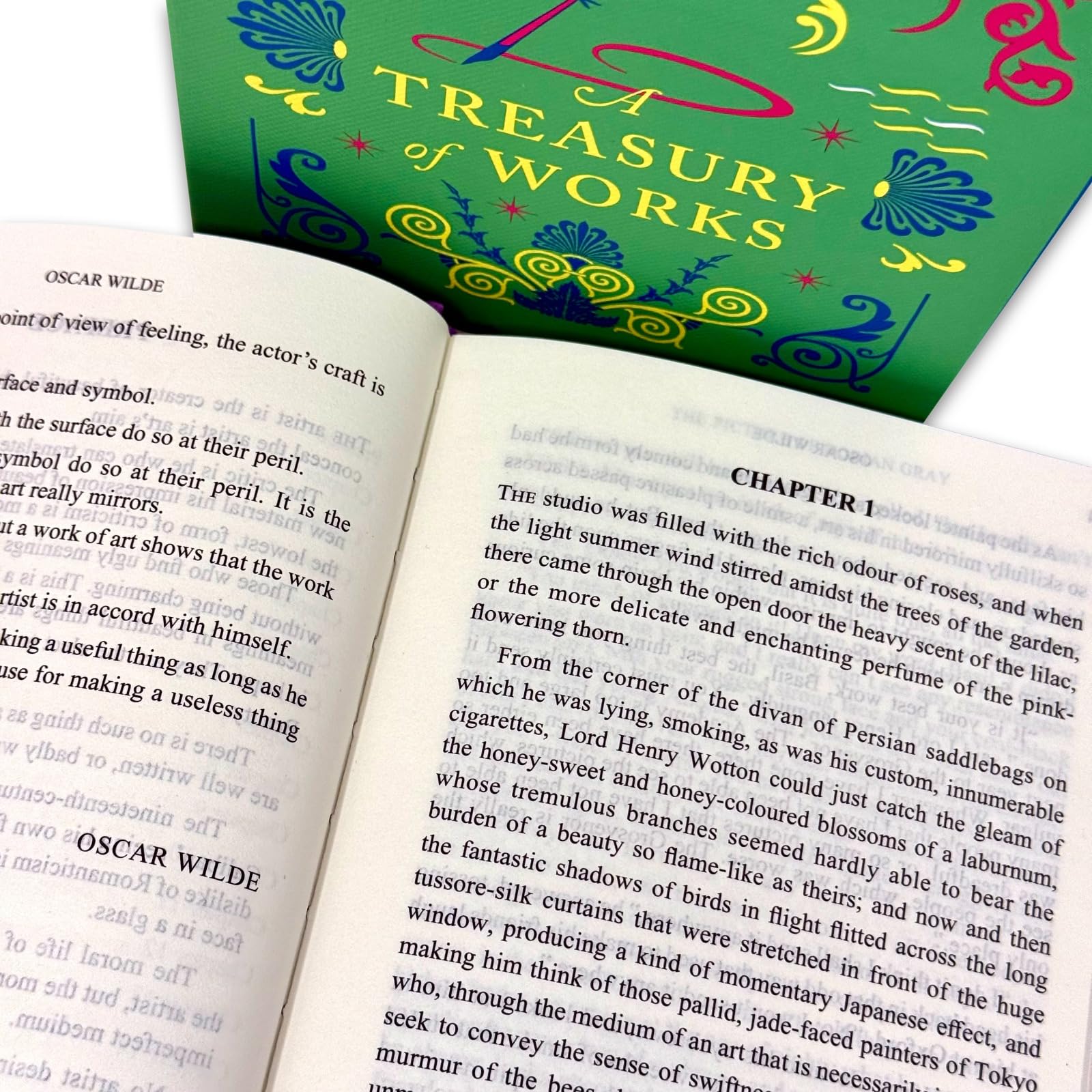 All four Oscar Wilde hardcover volumes fanned out together outside the treasury box set case