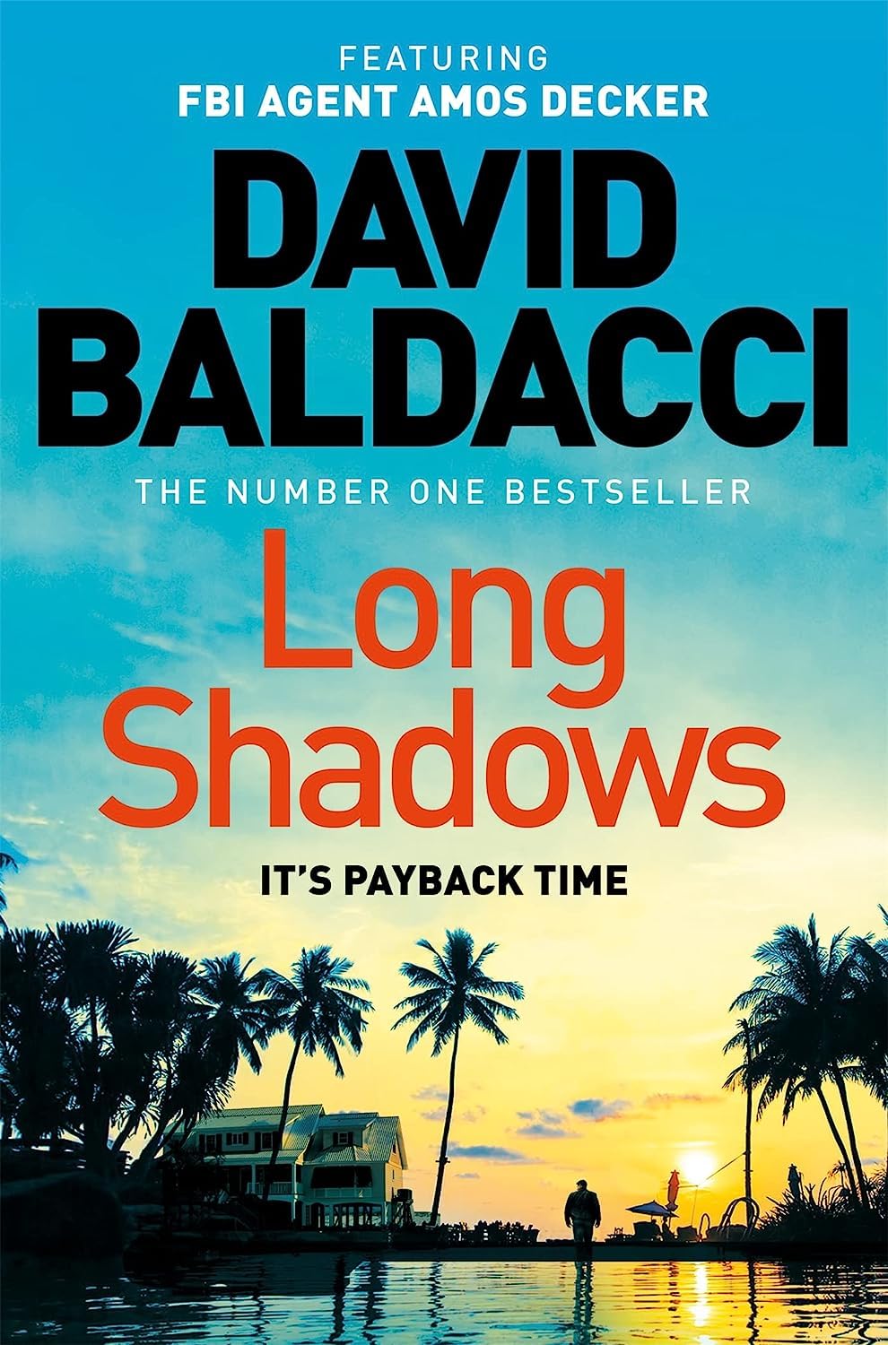 Amos Decker 7-book paperback collection set by David Baldacci stacked on a wooden tabletop.