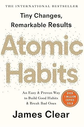Close-up of Atomic Habits by James Clear paperback cover, part of the 2 book collection set