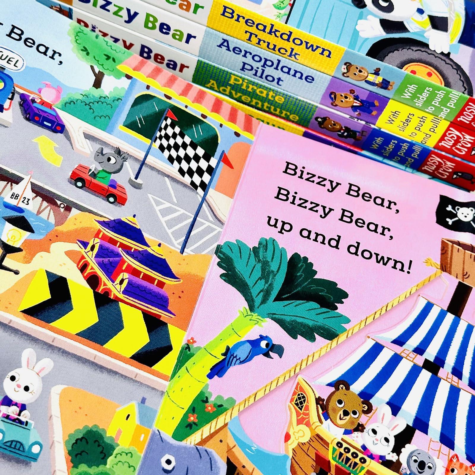 Close-up of Bizzy Bear: Pirate Adventure board book cover showing Bizzy Bear sailing a pirate ship
