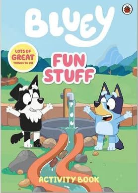 Bluey Tattle Tales storybook open alongside the 4 Bluey, Bingo, Bandit, and Chilli figurines