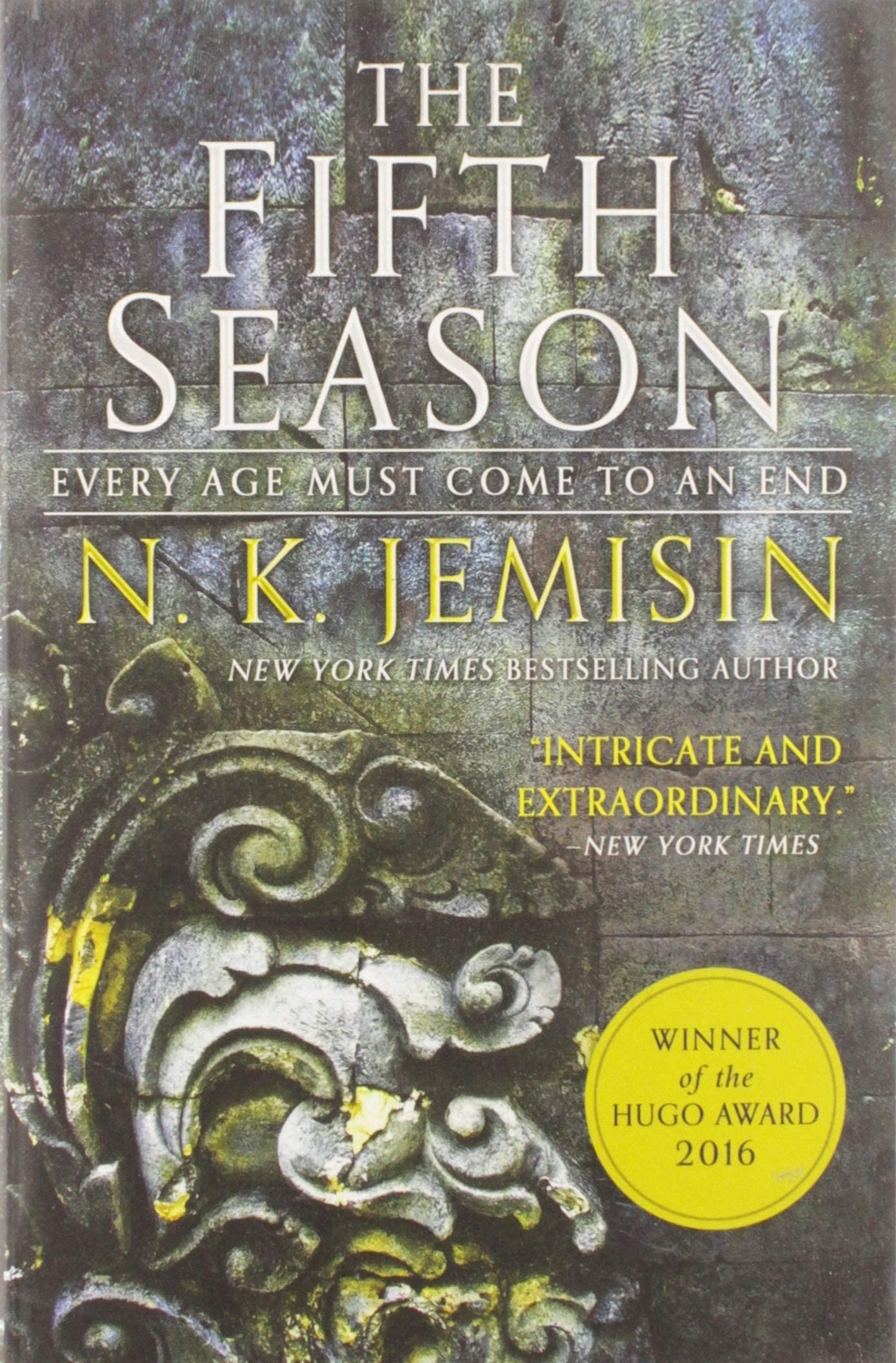 All three Broken Earth trilogy paperbacks by N.K. Jemisin fanned out together as a set