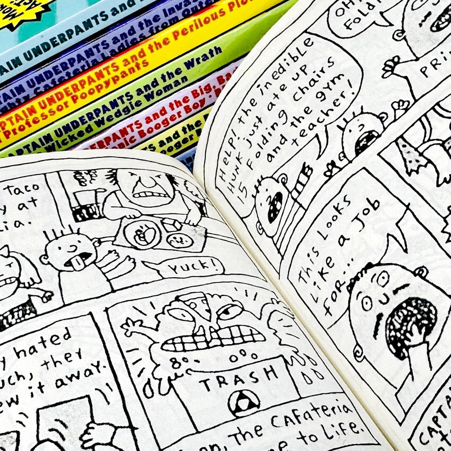 Stacked view of Captain Underpants paperback collection set spines by Dav Pilkey