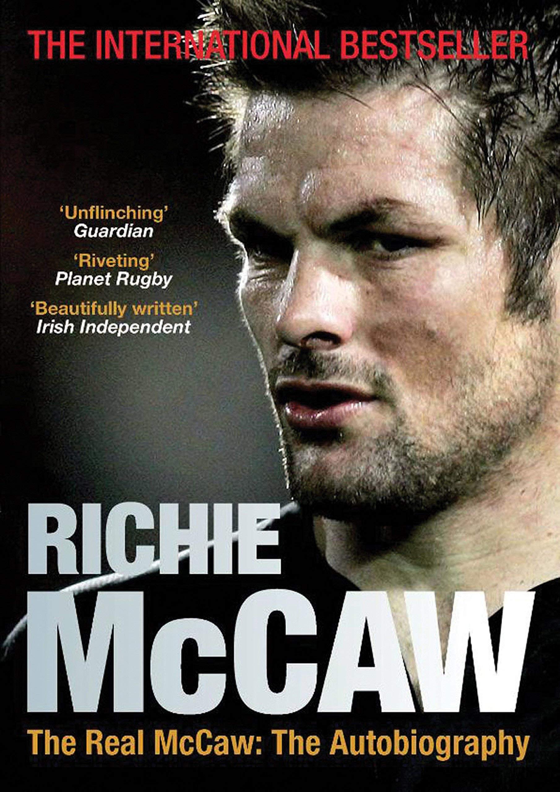 Close-up of the Carter & McCaw Autobiographies 2-book paperback collection on a wooden surface, highlighting the non-fiction rugby memoir covers.