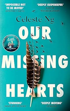 All three Celeste Ng paperback novels fanned out together showing Little Fires Everywhere, Everything I Never Told You, and Our Missing Hearts spines and covers
