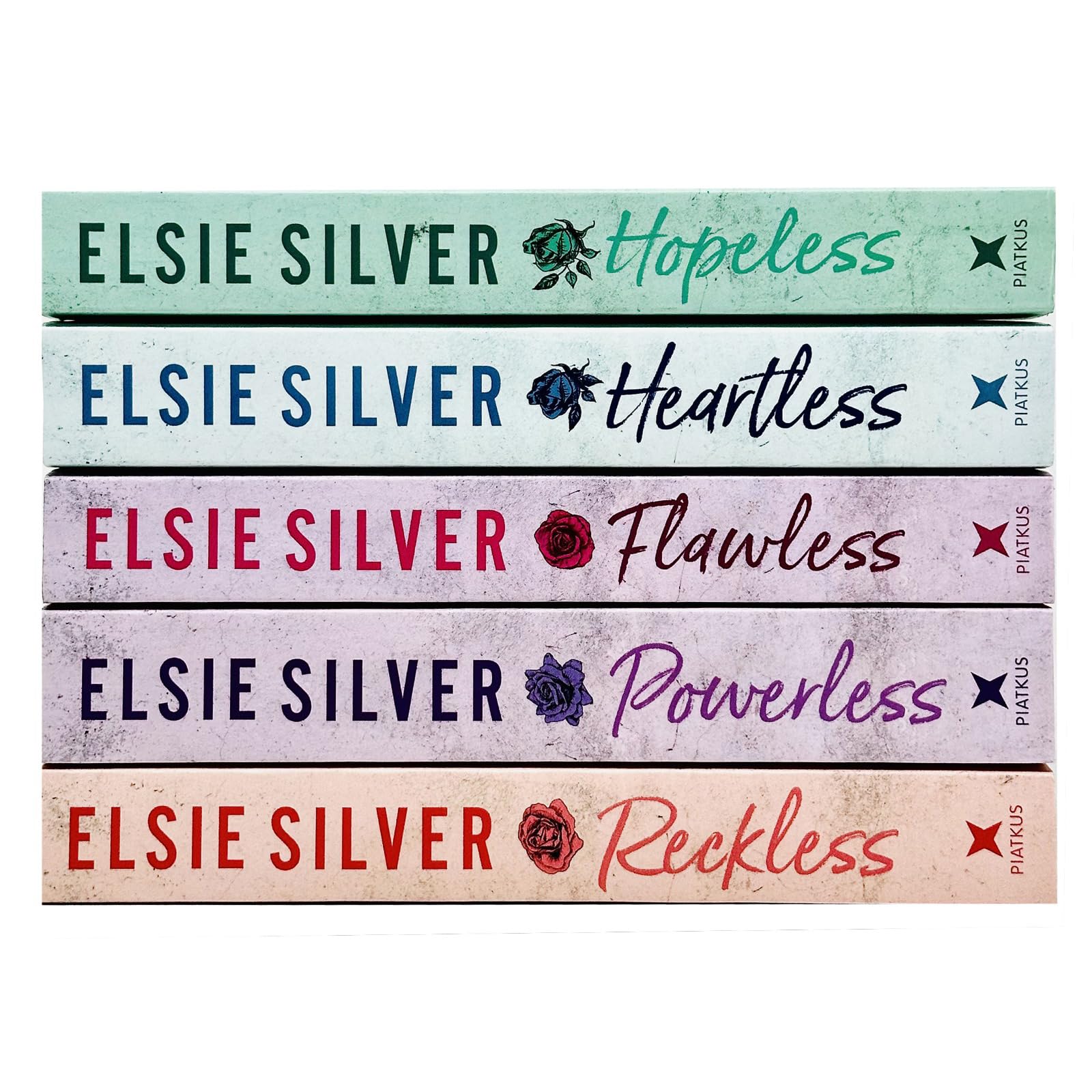 Close-up of the Chestnut Springs Series paperback covers by Elsie Silver, showing colorful cowboy romance artwork.