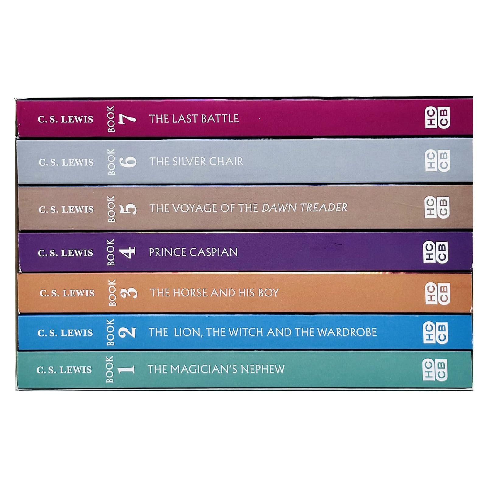 The Chronicles of Narnia 7-book paperback set by C S Lewis fanned out, displaying individual titles including The Lion, the Witch and the Wardrobe and Prince Caspian.