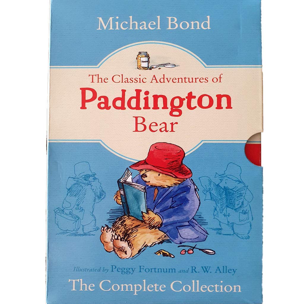 All 15 Paddington Bear paperback novels by Michael Bond fanned out showing individual titles in the collection
