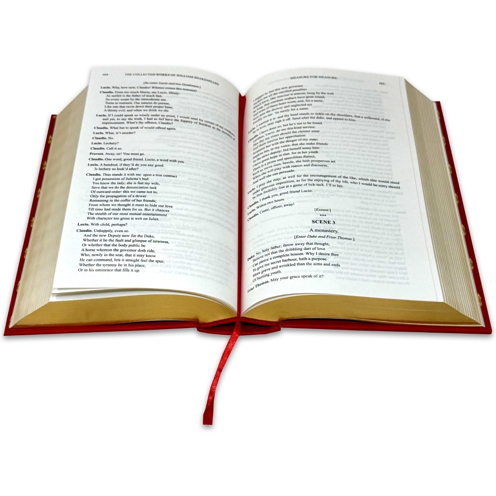 Angled view of the Complete Works of William Shakespeare deluxe leather-bound hardback standing upright on a shelf