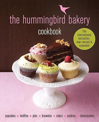 The Hummingbird Bakery Cookbook by Tarek Malouf hardcover cover with cupcakes and cakes