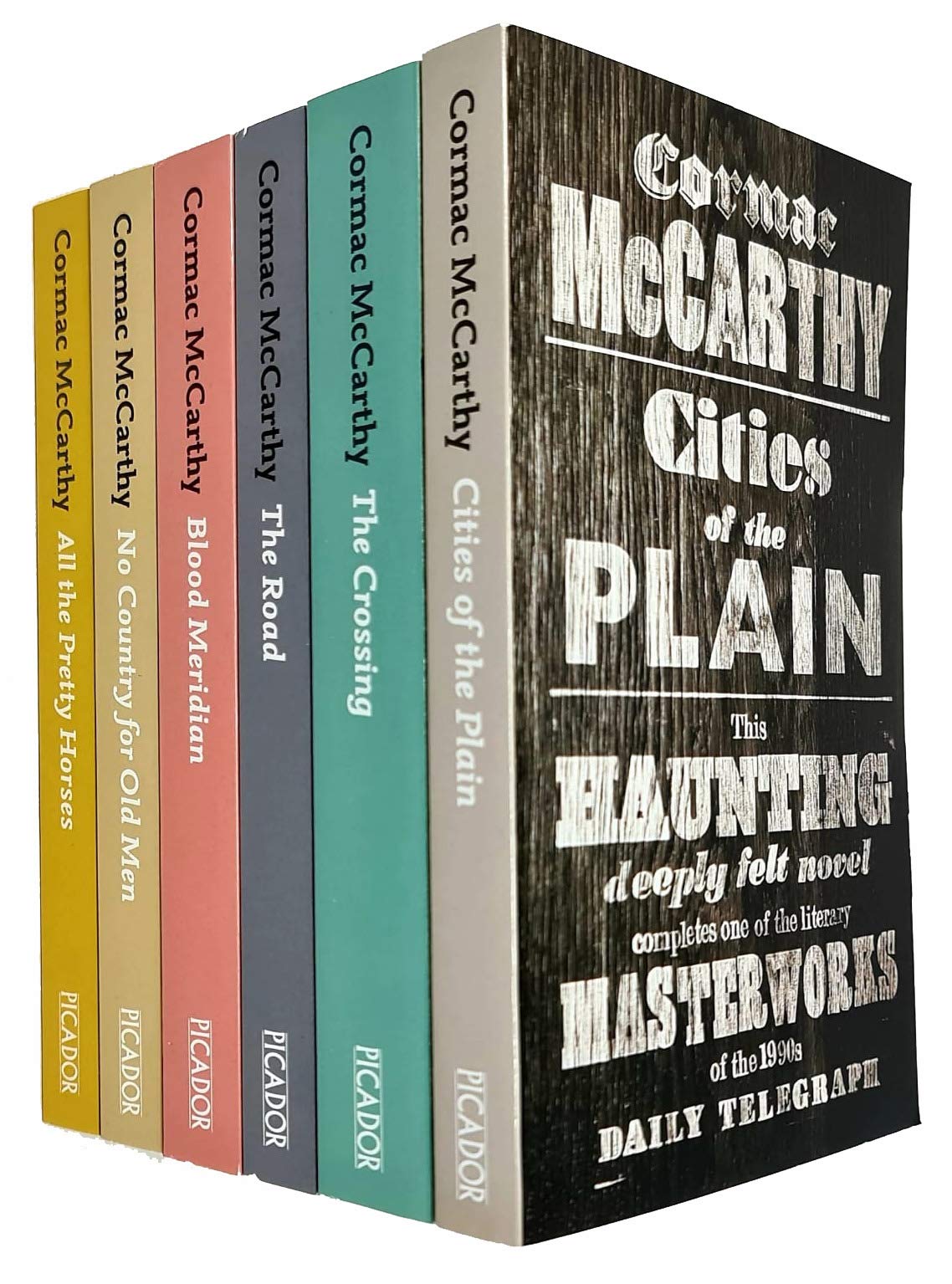 Cormac McCarthy Collection 6 Books Set paperback front cover showing The Road, Blood Meridian, No Country for Old Men, All the Pretty Horses, The Crossing, and Cities of the Plain