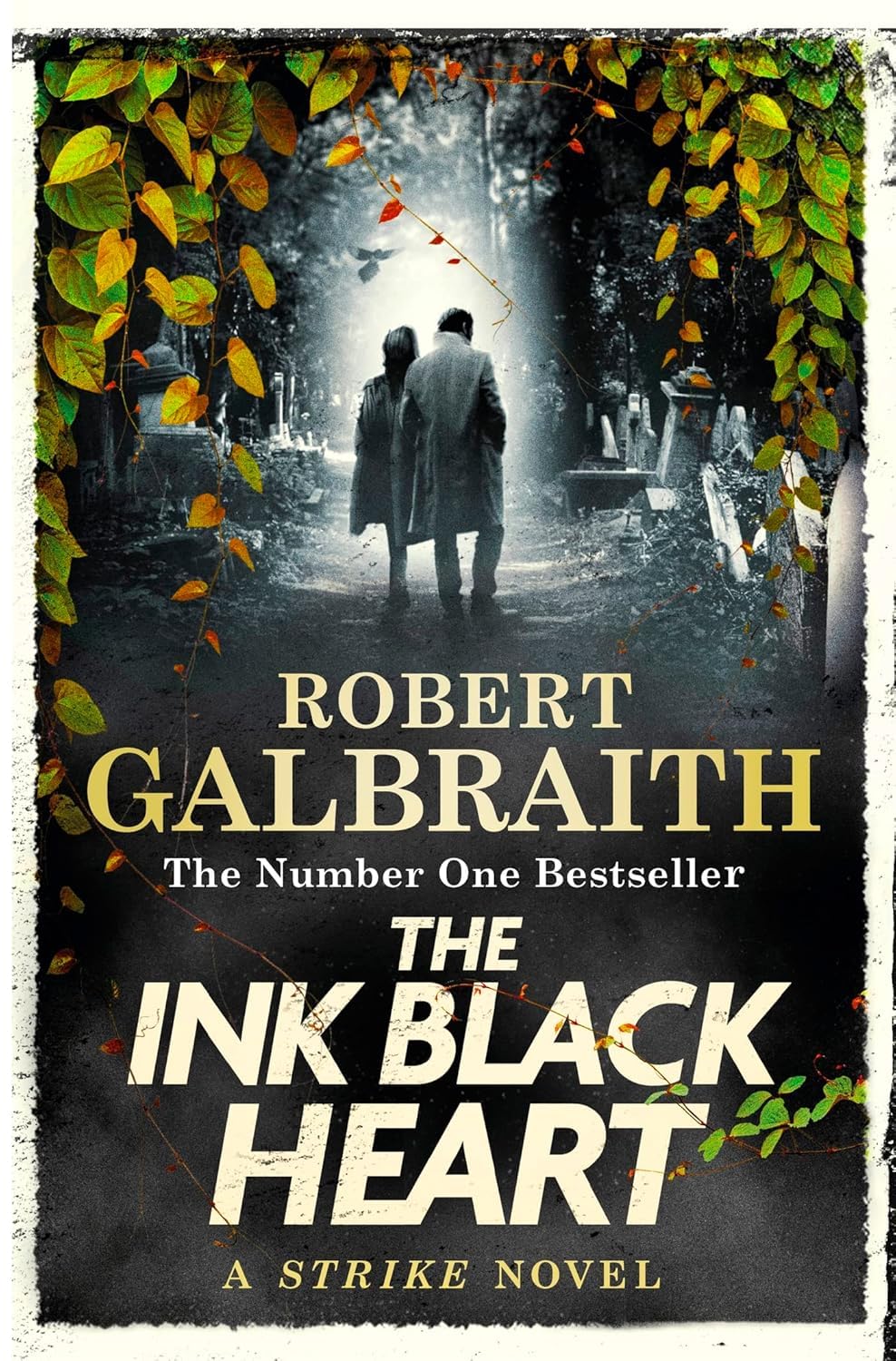 Close-up of The Cuckoo's Calling and The Silkworm paperback covers from the Cormoran Strike series
