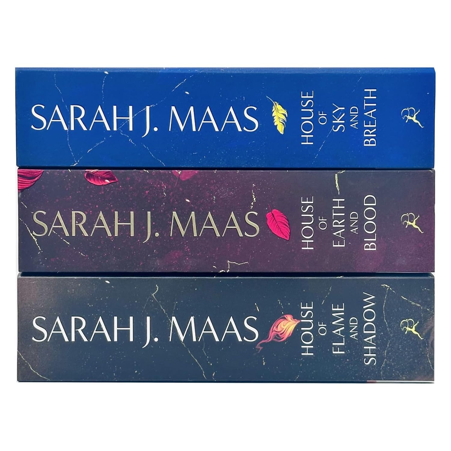 Front covers of House of Earth and Blood, House of Sky and Breath, and House of Flame and Shadow paperback books by Sarah J. Maas.