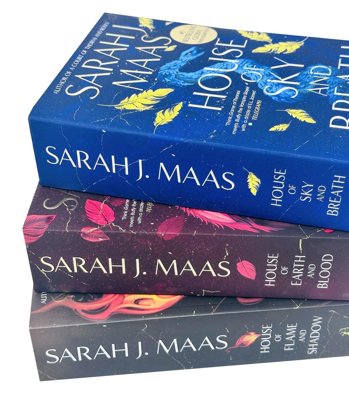 Crescent City paperback collection set by Sarah J. Maas fanned out to show spine and cover art detail, published by Bloomsbury.